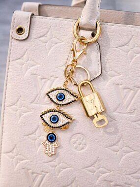 Louis Vuitton Gold Lock 🔒 Authentic LV Key + Unbranded Evil Eye Bag Charm